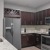 a kitchen with black cabinets