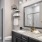 a bathroom with a large mirror