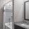 a bathroom with a shower and sink