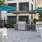 a patio with tables and chairs