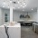 a kitchen with a table and chairs