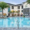 a pool in front of a building