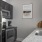 a kitchen with a stainless steel sink